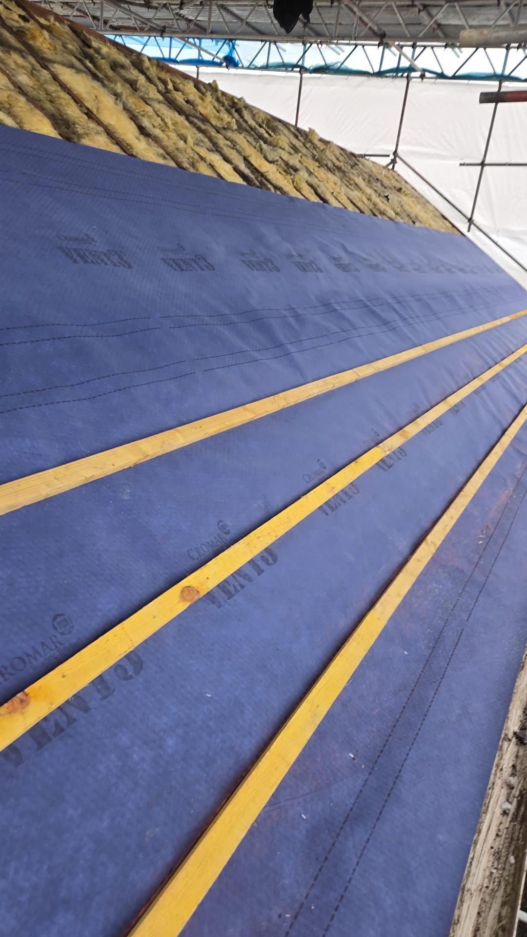 Breathable roofing felt installed with new treated battens roof preparation stage