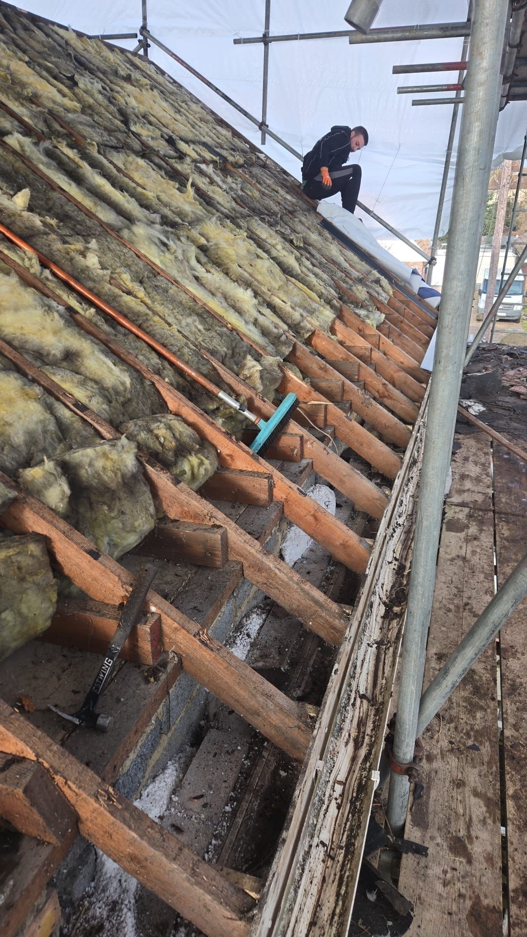 Roof strip out old tiles removed rafters exposed Kent roofing project